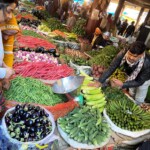 Explore the vibrant Okhla Sabzi Mandi with our lively hostess - an unforgettable culinary journey! Lively visit to Okhla Sabzi Mandi with our vibrant hostess - an authentic Delhi adventure!